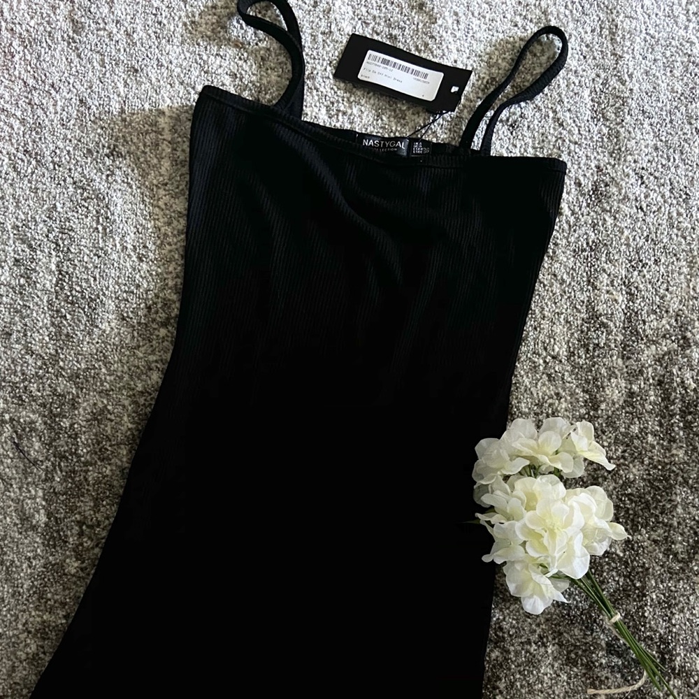 FLIP EM OFF MINI DRESS ( NEVER WORN)